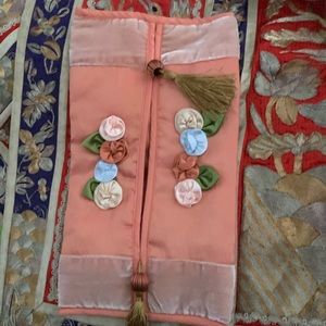 Vintage lingerie storage pouch.